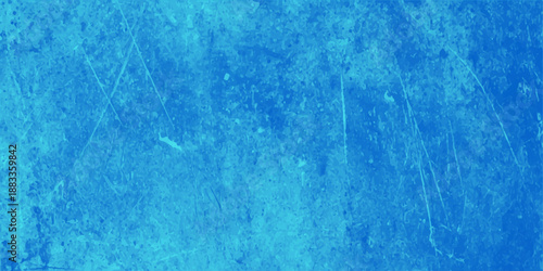 A vibrant turquoise splash of liquid paint ripples across a weathered blue wood wall, creating a cold, frozen grunge texture that serves as a clean nature-inspired backdrop