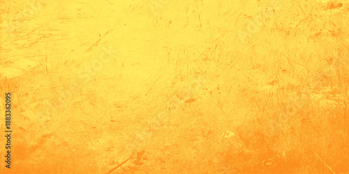 A blank vintage parchment with a stained grunge texture features an aged yellow wall pattern and antique brown paper surface for a retro design