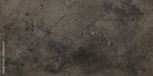 Aged dark gray stone wall texture with a rough grungy concrete surface and vintage weathered pattern creates a dirty old black stone backdrop.  grey, grungy, paper, paint, textured