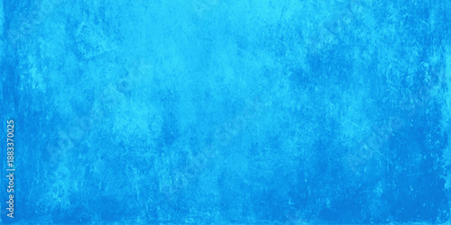 A textured blue grunge background features a vintage paint pattern on a rough aged paper material with light watercolor art effects and a dirty old wall surface design