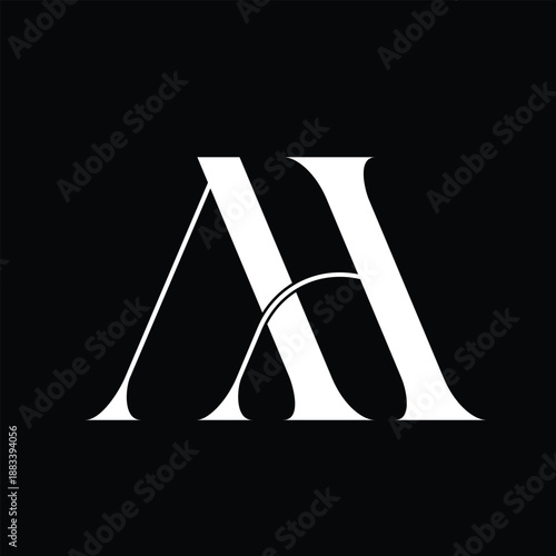 Elegant monogram of the letters A and H in white on a black background, symbolizing luxury and sophistication