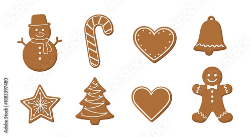 Collection of assorted brown gingerbread cookies in various Christmas shapes like a snowman, tree, bell, and star on white background.