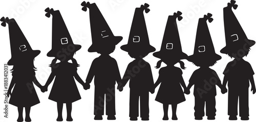 Silhouette of seven children wearing witch hats holding hands