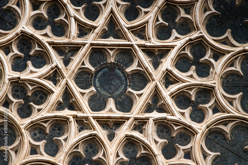 Фотография detail of rose window in a gothic cathedral
