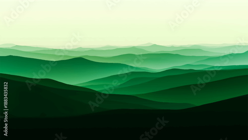 Scenic mountain landscape with a peak and valley under a sunset sky filled with clouds, mist, and morning haze over a blue forest horizon