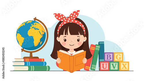 Cute young girl with a polka dot headband sitting at a desk reading an orange book next to a globe and alphabet blocks.
