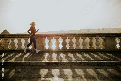 Woman runs along the seasid...
