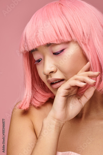 Fotografie Captivating moment of a young woman with pink hair embracing a dreamy aesthetic