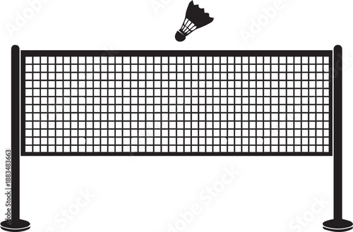 Badminton shuttlecock flying over net during match play on court