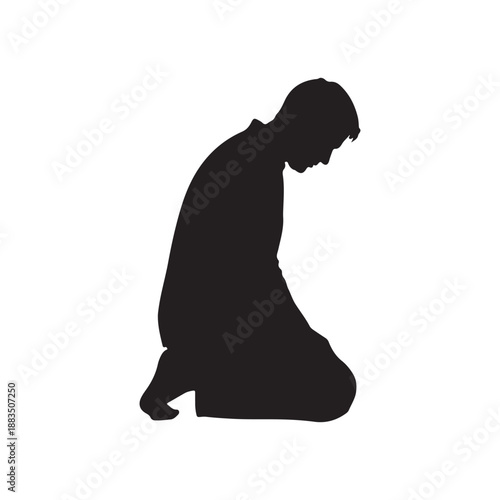 silhouette of side view of a man on his knees staring at the ground 
