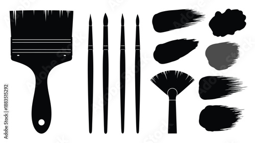 a collection of various black paint brushes arranged neatly in a row