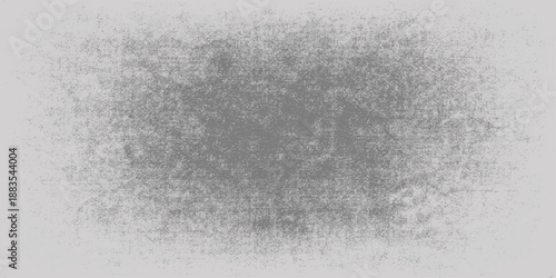 An abstract black and white grunge background featuring a dark textured stone surface with a rough vintage paint pattern and gray cement marble design for a dirty old paper wall backdrop