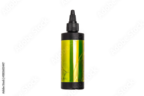 Black applicator bottle with a metallic yellow-green label, isolated on a white back