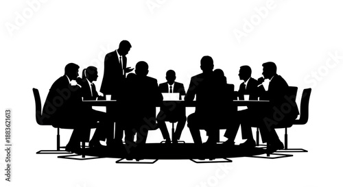 Silhouette of a group of businesspeople sitting around a conference table in a meeting with a presenter standing silhouette