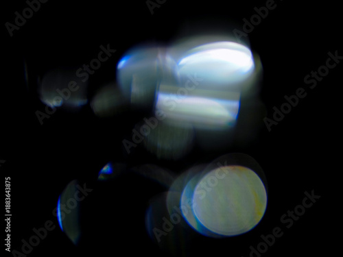 Blue color light leaks on dark background for design and special effect. Abstract shape and color.