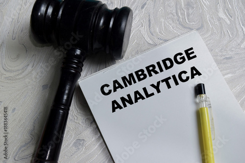 Bilde på lerret Concept of Cambridge Analytica write on book isolated on Wooden Table