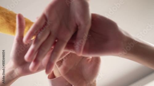 Wallpaper Mural Startup company employee team gladly stacking hand together symbolize successful group of business partnership and strong collective unity teamwork in community workplace in panoramic video. Synergic Torontodigital.ca