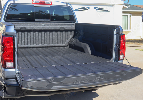 View of the back of a truck with a spray-on bed liner.
