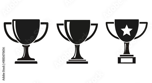 Set of three black trophy icons with different designs.