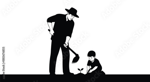 Father and son planting seedling together