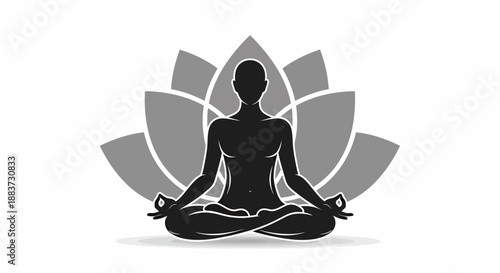 Silhouette of a person meditating in lotus position with lotus flower background.