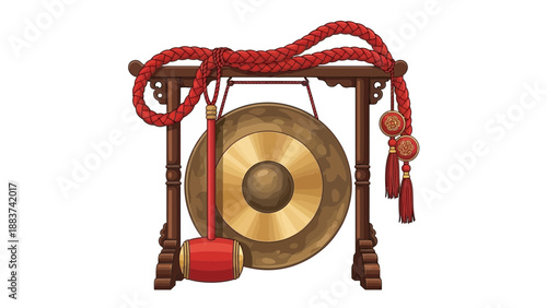 Traditional Asian gong with mallet and decorative ropes.