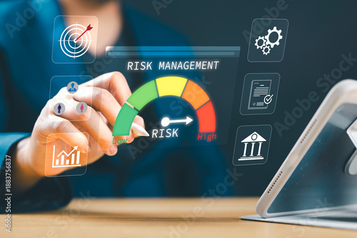 Fotografie Businessman managing and assessing investment risks, focusing on risk control, forecasting, estimation, and financial strategy for effective business management