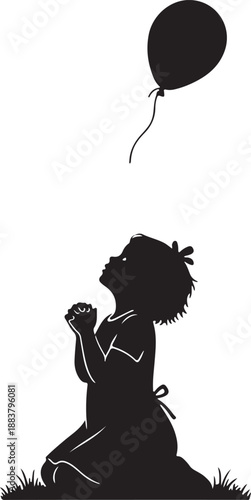 Little girl praying silhouette looking up at balloon flying away