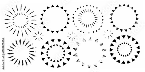 a collection of black and white circular bursts and geometric shapes arranged closely together