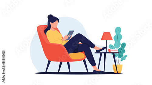 Young woman relaxing in an orange armchair while using a digital tablet with a lamp and potted plant in a home setting.