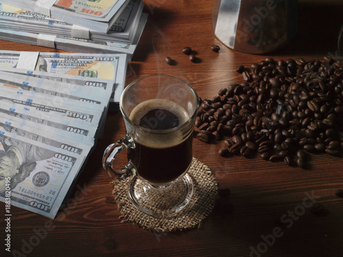 coffee beans on the background of a coffee cup and money. the concept of coffee.