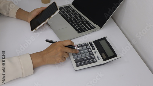 Business finance man calculating budget numbers, Invoices and financial adviser working.