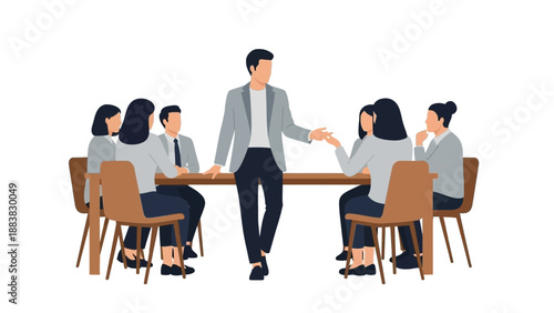 Business Meeting Leader Discussing Strategy with Team Around Table