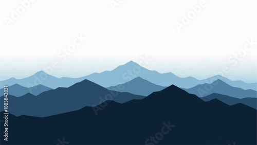 Layered Blue Mountain Range Silhouette Against White Sky.