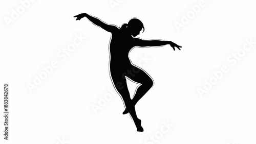 Silhouette of a female dancer in graceful pose.