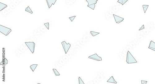 Randomly dispersed sharp fragments creating an abstract composition, symbolizing moments of breakage and change