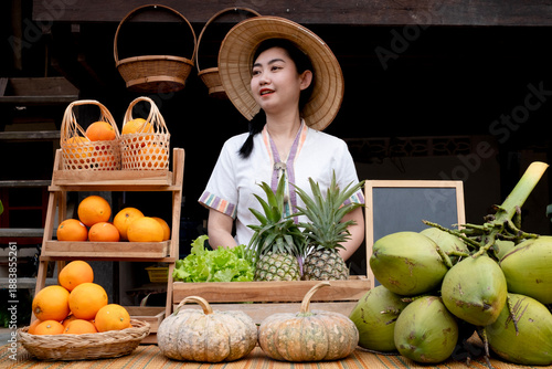Native Asian women welcome tourists with a variety of natural fruits at farmstays and homestays in Thailand.
