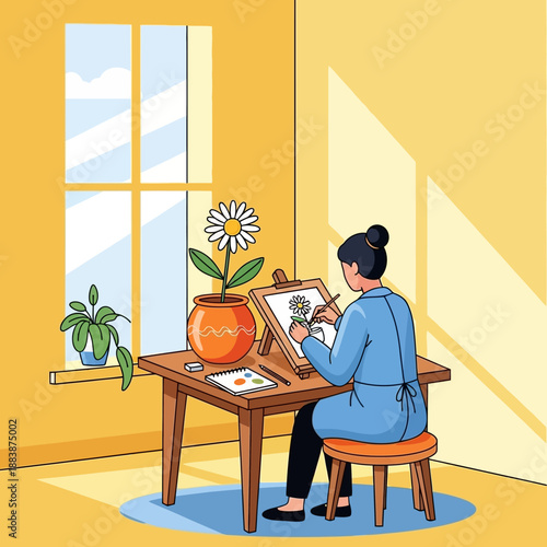 Artist painting daisy flower in pottery on easel at desk, natural light from window