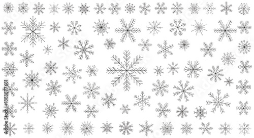 Vast assortment of intricate black snowflake sketches featuring many different crystal patterns for winter holiday designs.