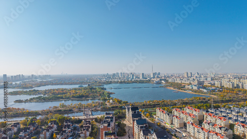 Aerial view of the urban architectural scenery and autumn landscape of Qingfeng Lake in Dongying, Shandong, China