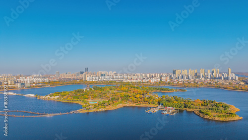 Aerial view of the urban architectural scenery and autumn landscape of Qingfeng Lake in Dongying, Shandong, China
