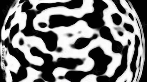 An organic black and white pattern with blurred edges, resembling a spotted or marbled surface