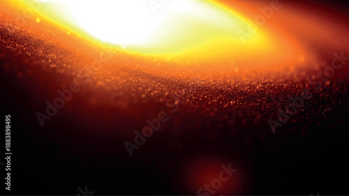 Grainy textured abstract background with glowing golden light and warm amber particles fading into darkness