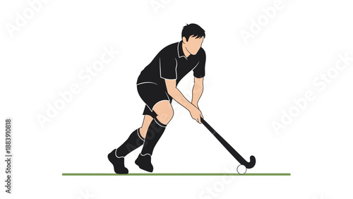 Man playing field hockey with stick.