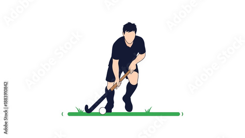 Man playing field hockey with stick.