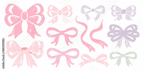 Collection of pastel colored bows in various shapes and styles arranged closely