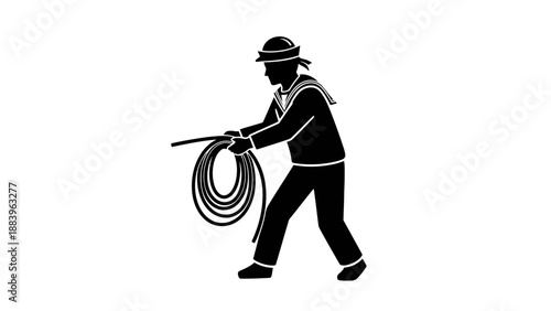 Firefighter holding a coiled hose.