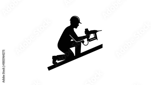 Worker on roof with power drill.