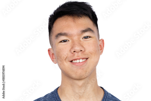 A close-up portrait of an Asian teenager smiling warmly at the camera against a white background, ideal for headshot, profile photo, or identification concepts.