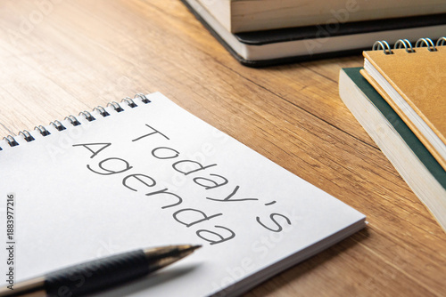 A notebook with the words Today's Agenda. Productivity, time management, and daily planning concept.